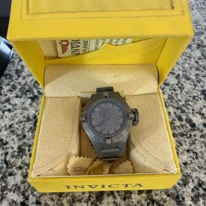 Brand new Invicta watch. Heavier watch. Excellent condition, needs new battery.